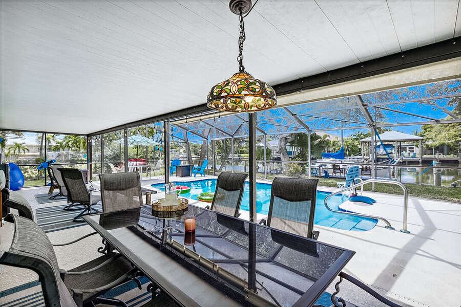 Savor meals outdoors with a beautiful poolside view—dining al fresco at its best!