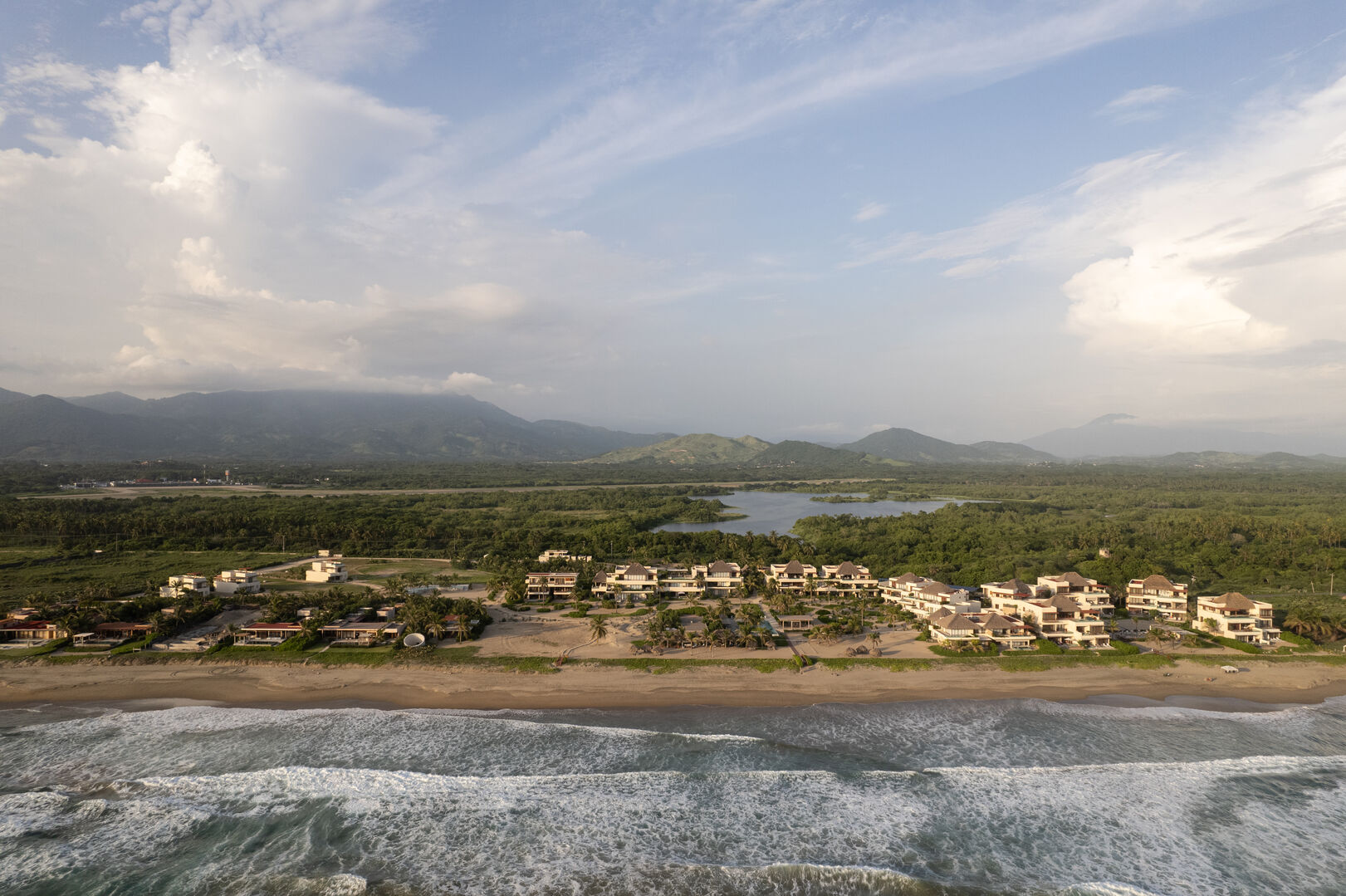 Take in breathtaking views of this exclusive oceanfront community, nestled between lush greenery and pristine beaches.