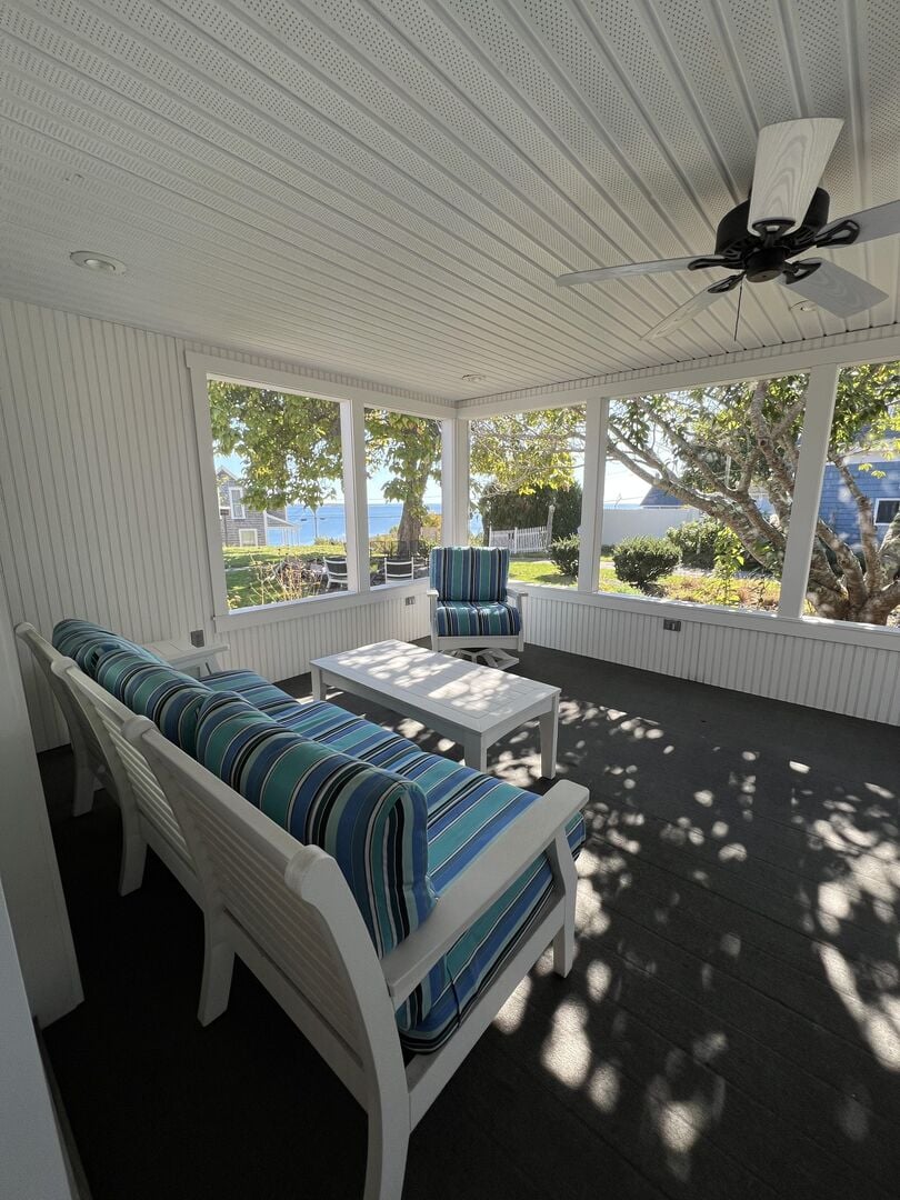 Screened in porch with ocean views.