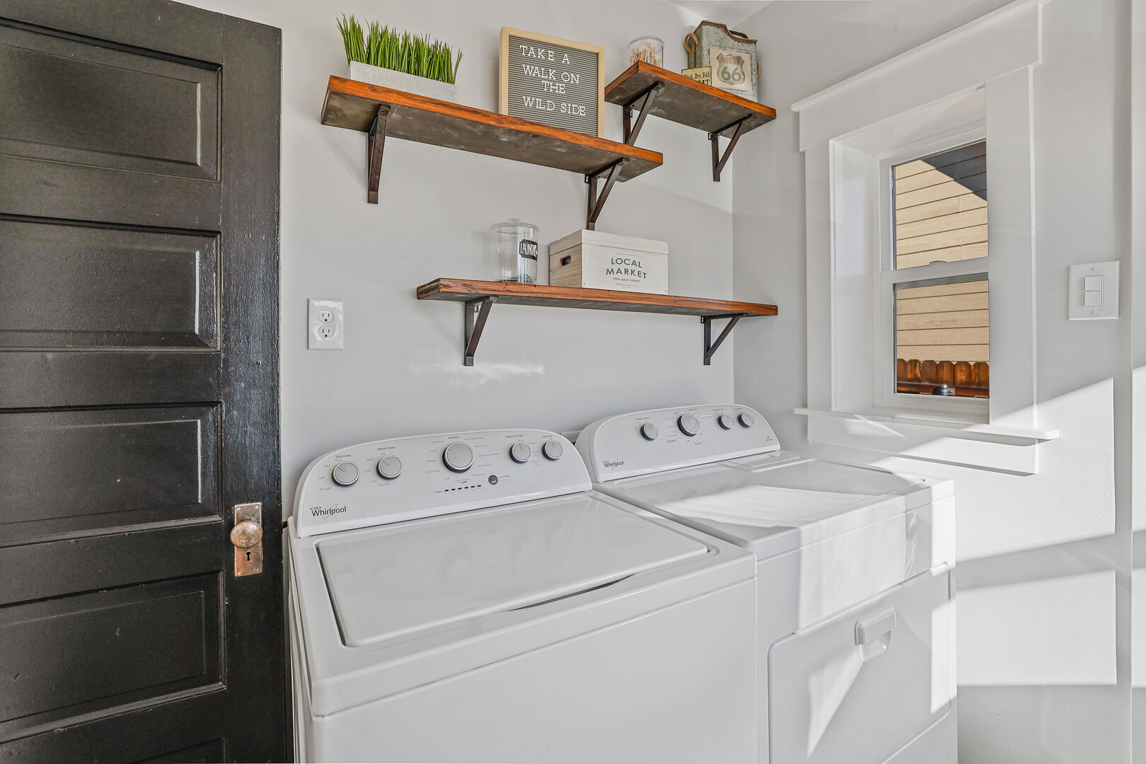 A full washer and dryer are conveniently located in a room adjacent to the kitchen, making it easy to refresh your clothes during your stay.
