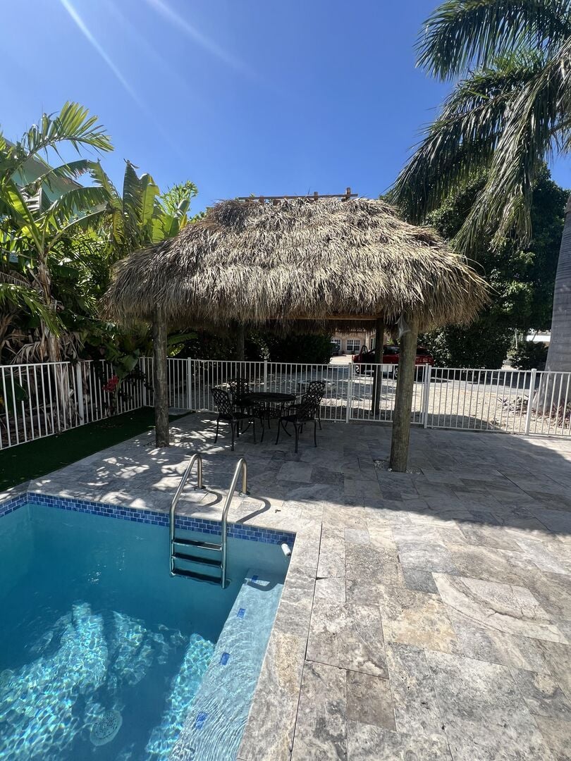 Soak up the vibes in our brand-new poolside Tiki Hut — your perfect lounge spot!