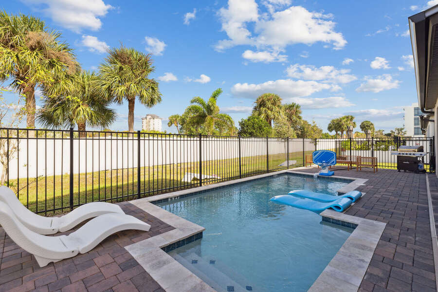 Sparkling private pool with loungers, perfect for sunny days.