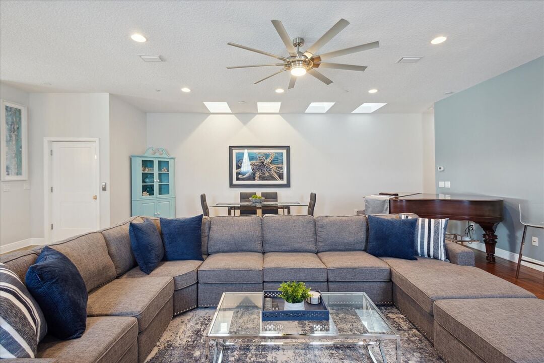 Modern living room couch in a bright, well-lit space, the couch invites relaxation.