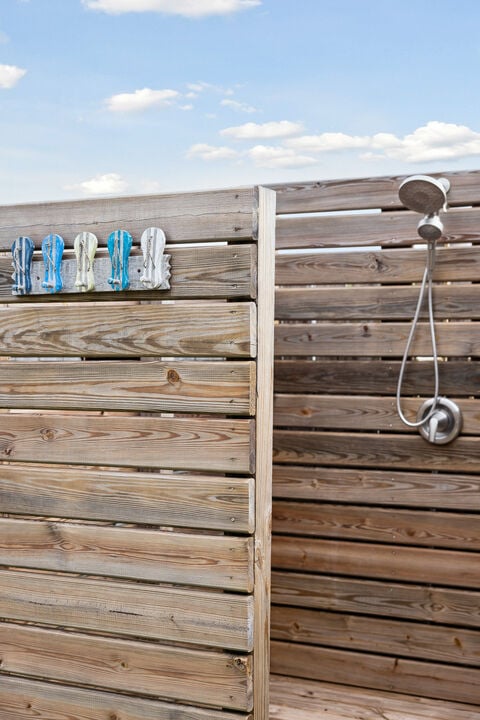 Outdoor shower surrounded by nature,