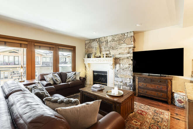 Leather furnishings including a queen, memory foam sleeper sofa and balcony access