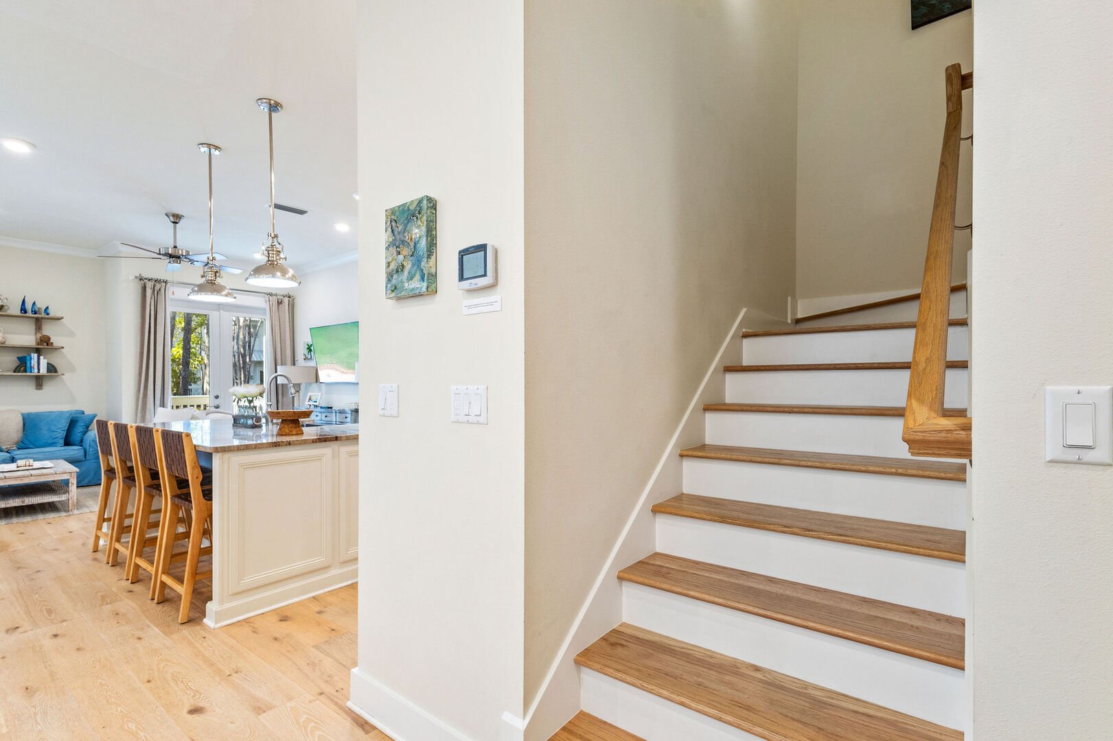 Stairs lead the 2nd floor featuring three bedrooms and a full bath.
