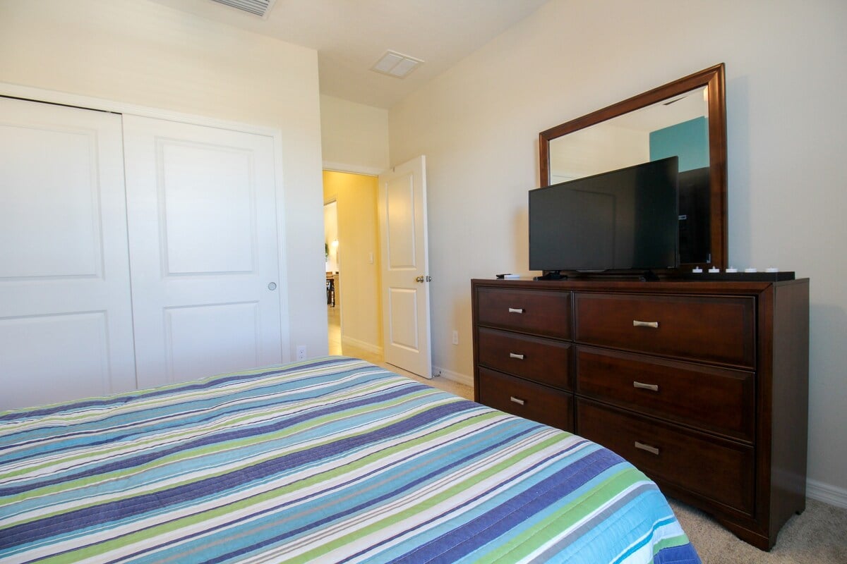 TV And Plenty Of Space For Personal Belongings