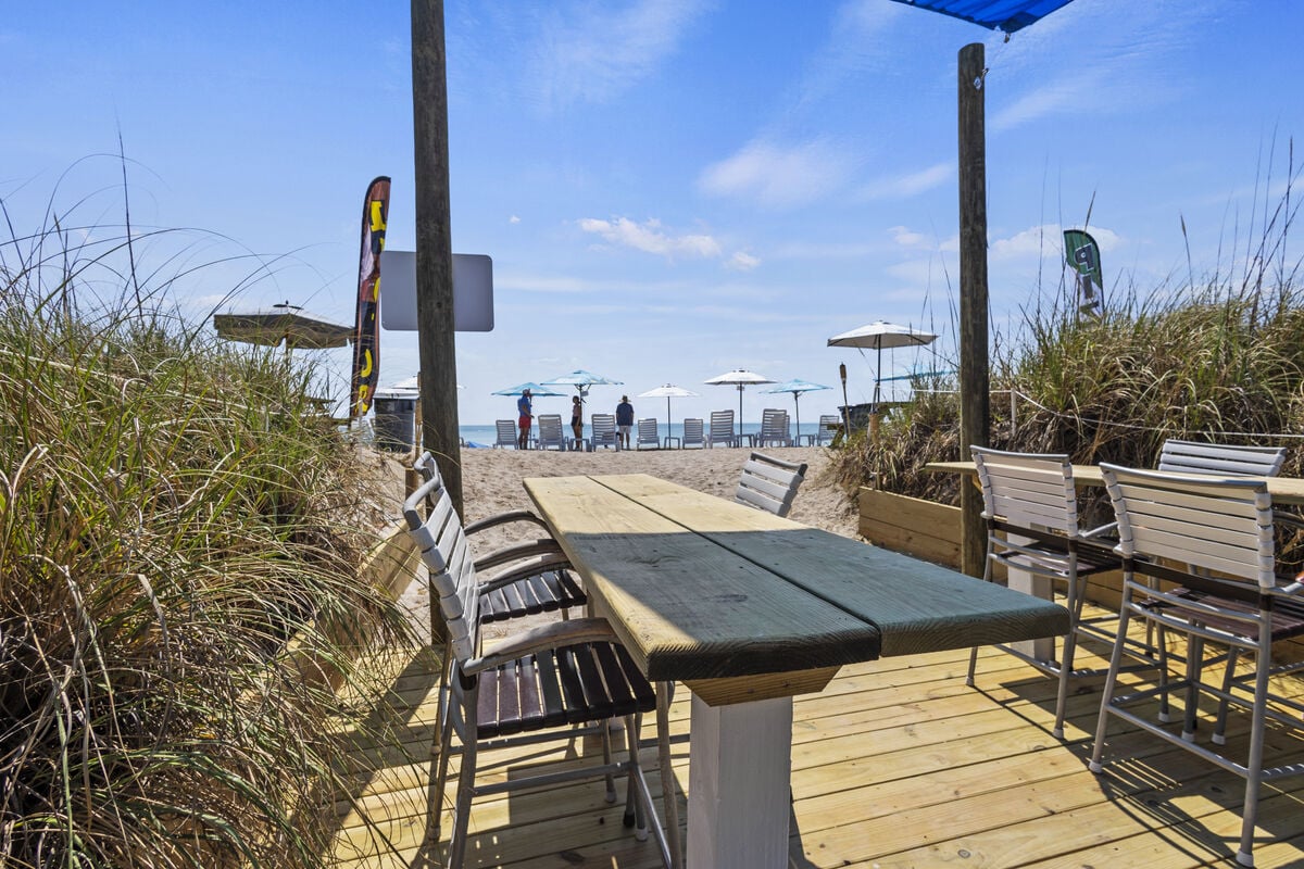 Walk out to the beach from the Dune Bar.