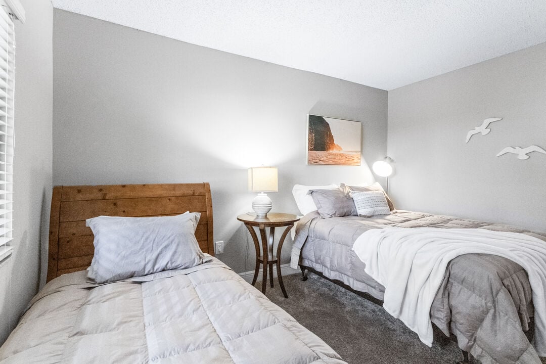 Comfortable guest bedroom with soft bedding, ideal for restful nights.