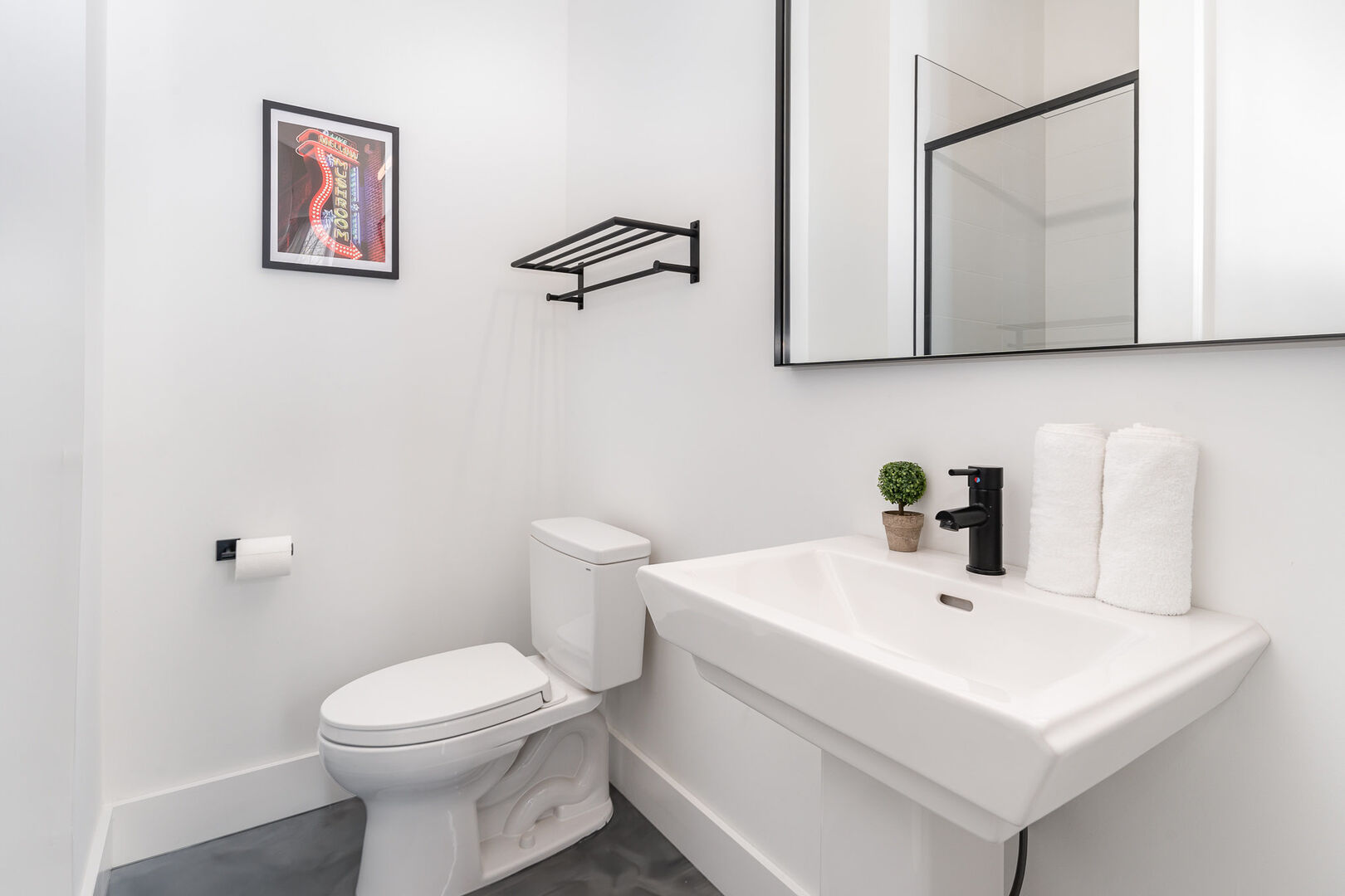 1st Floor: 4th Bathroom featuring a single vanity and stand-in shower.