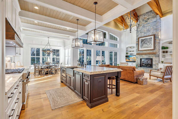 Chef's Kitchen & Butler's Pantry: Fully equipped with a gas range, pot filler, dual refrigerators, and a second dishwasher.