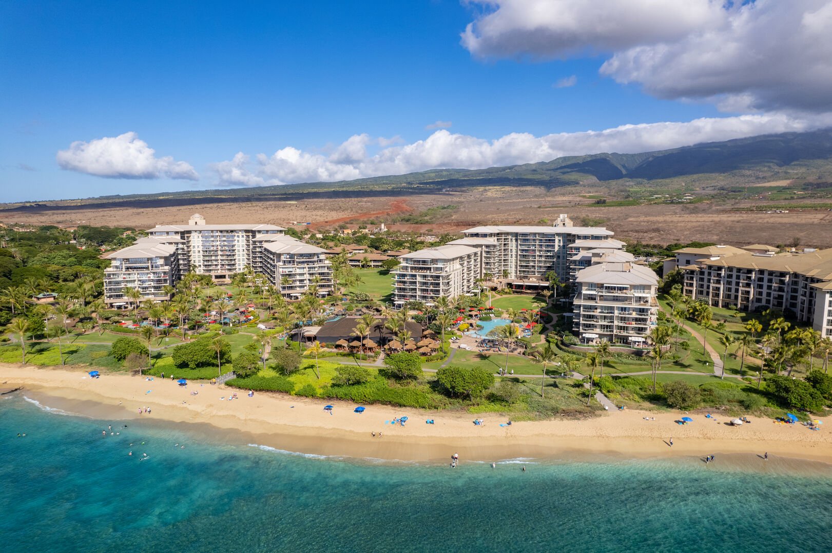 A breathtaking aerial view of Honua Kai Resort, featuring its prime beachfront location on Kaanapali Beach with stunning views of the Pacific Ocean. Perfect for luxury and relaxation.