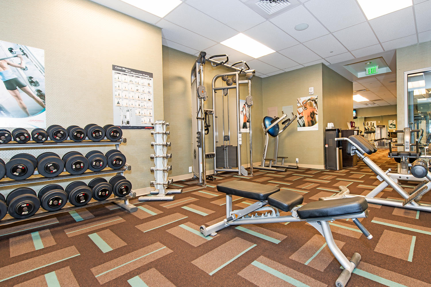 The fitness center at Honua Kai offers a comprehensive strength training area with free weights and machines to suit all fitness levels.