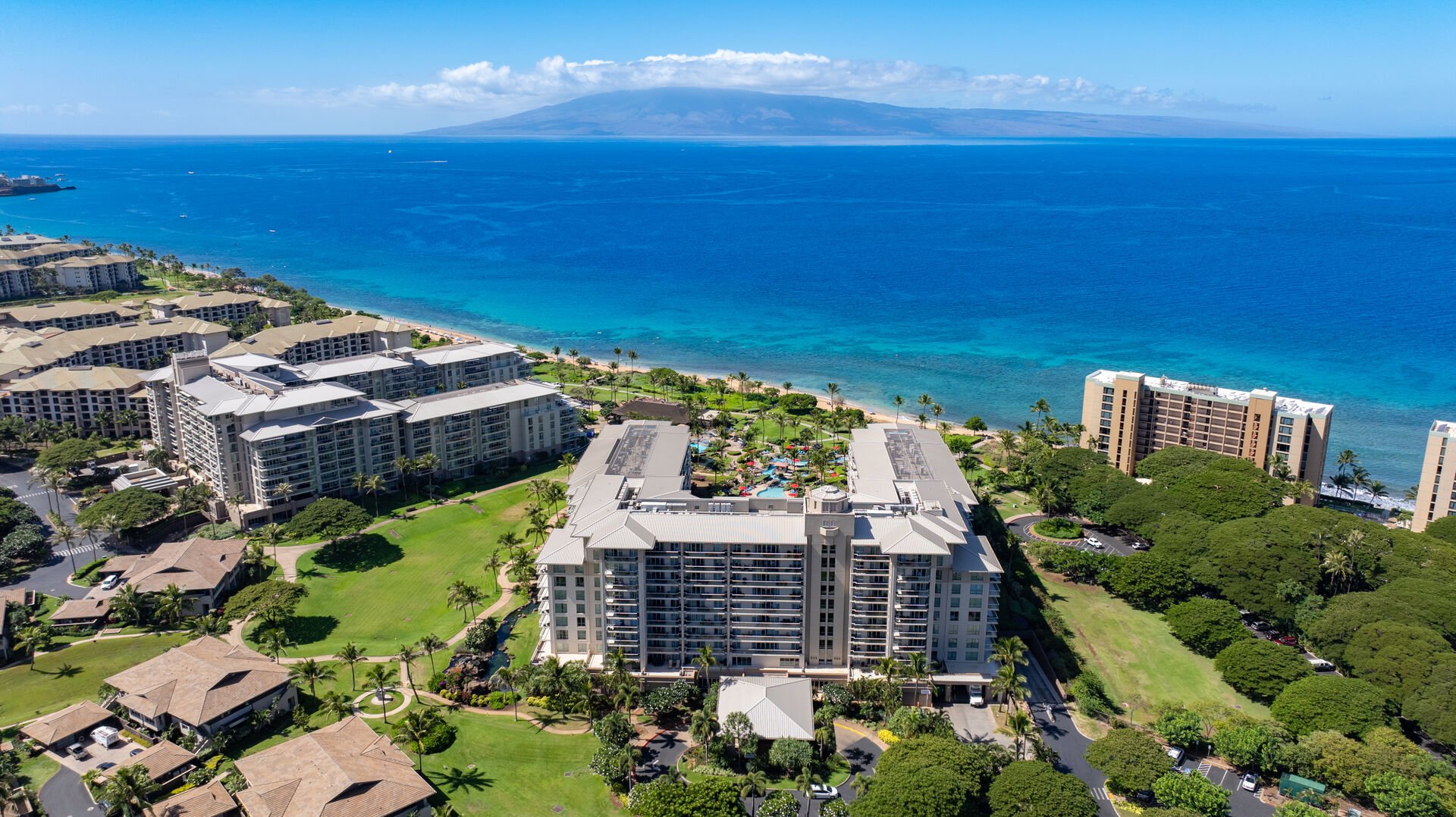 Enjoy sweeping views of the Pacific Ocean and nearby islands from this luxurious beachfront resort, offering direct beach access and tropical landscaping for a serene vacation experience.