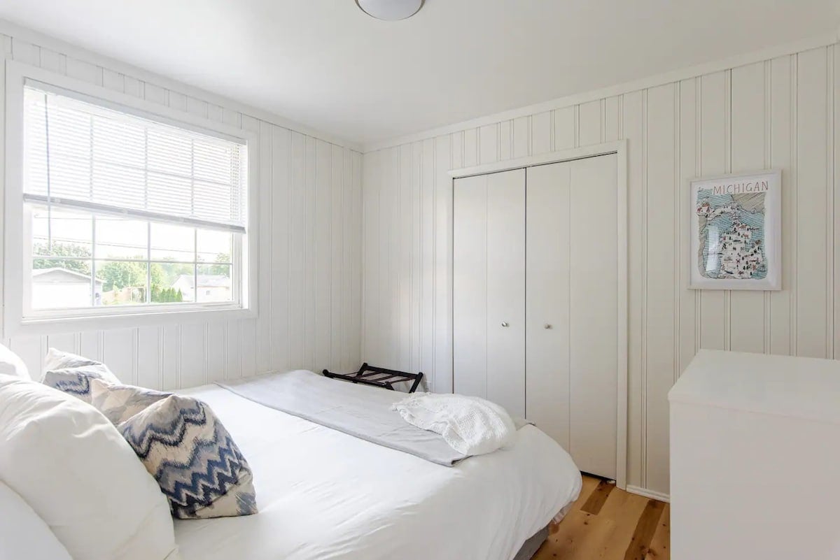 Retreat to a luxurious master bedroom featuring plush bedding, ample storage, and a serene ambiance your perfect private oasis.