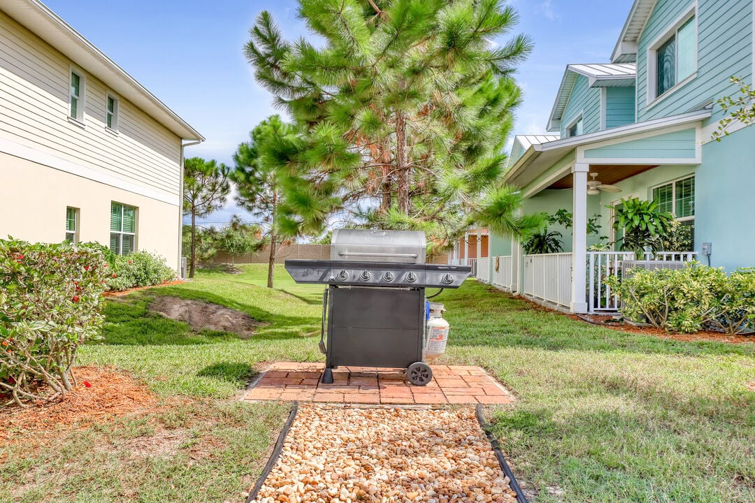 Fire up the grill & enjoy outdoor dining in a peaceful backyard!