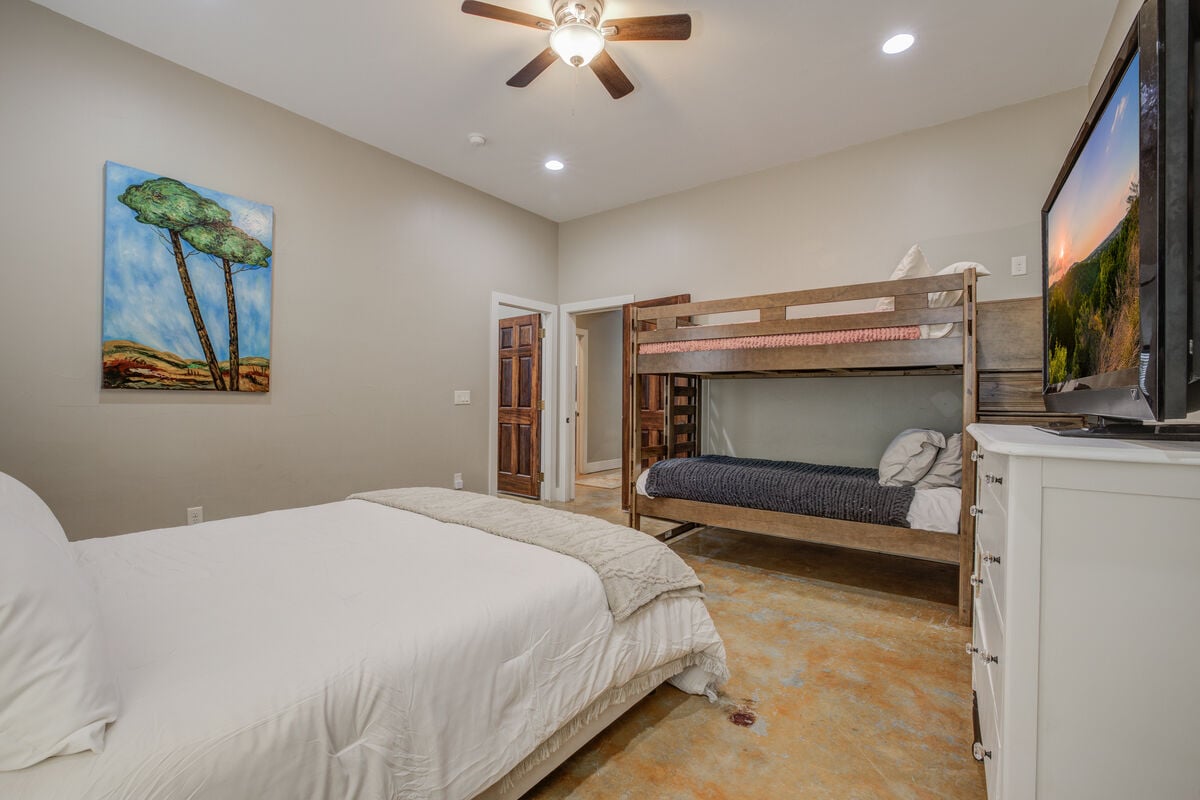 A functional and fun room with bunk beds, ideal for kids or group stays.