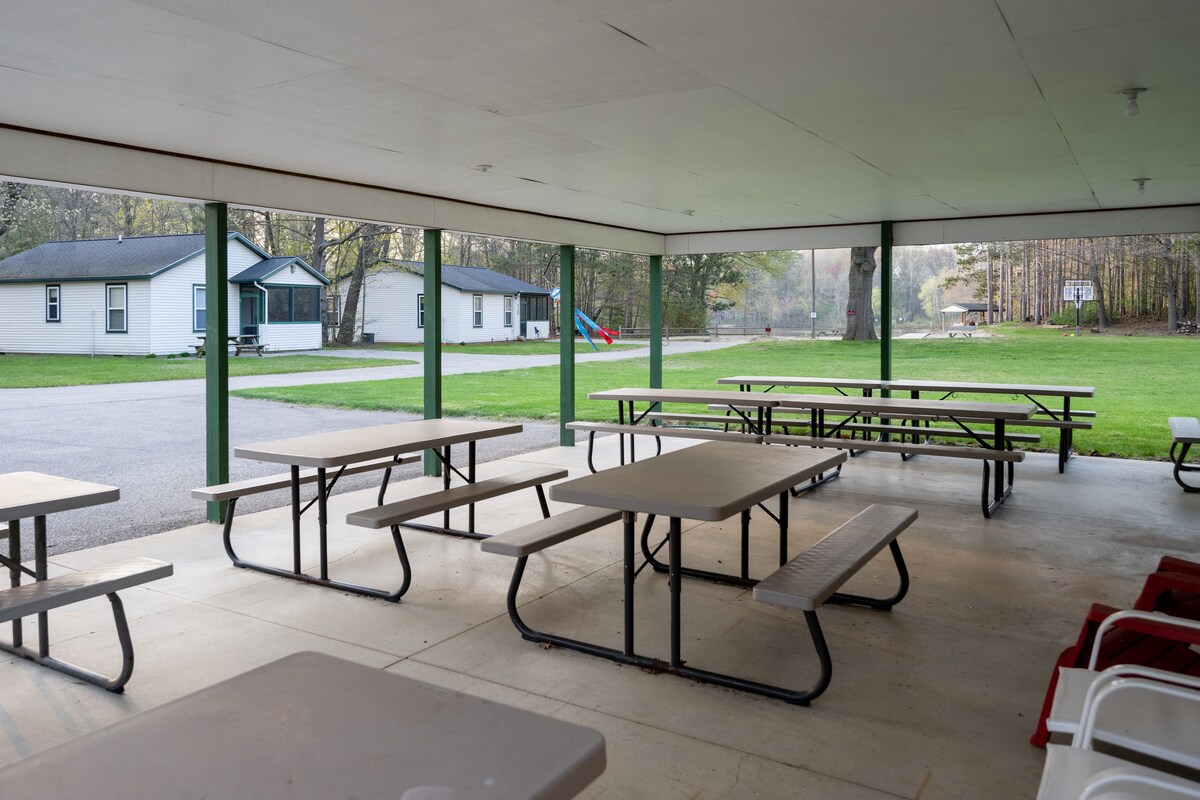 Covered pavilion with picnic tables.