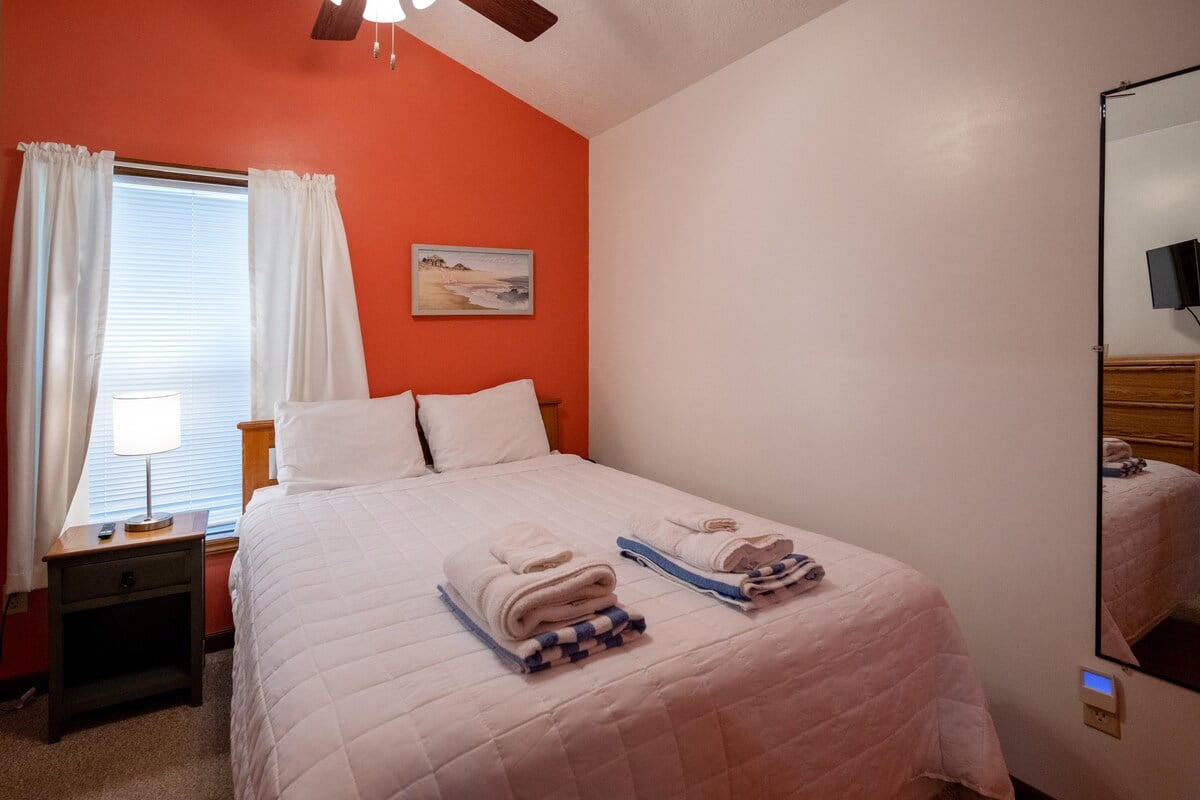 Primary bedroom with queen bed