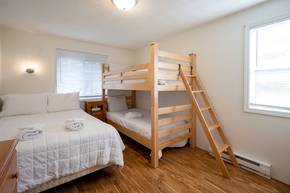 Second bedroom with one full size bed and twin bunkbed.