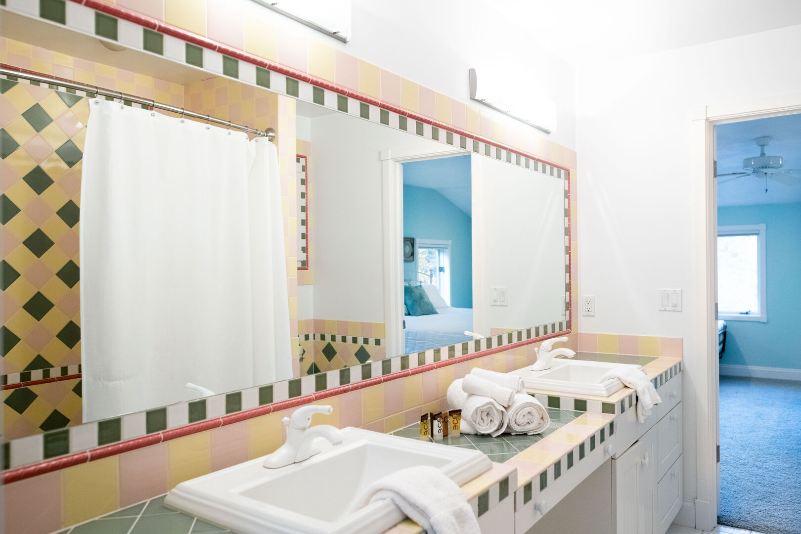Upstairs shared bathroom with tub and shower.