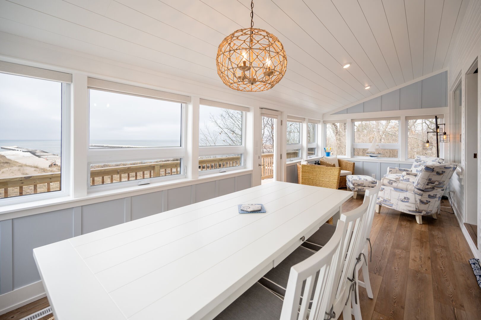 Front Screened in Porch with dinning table and  seating for 8