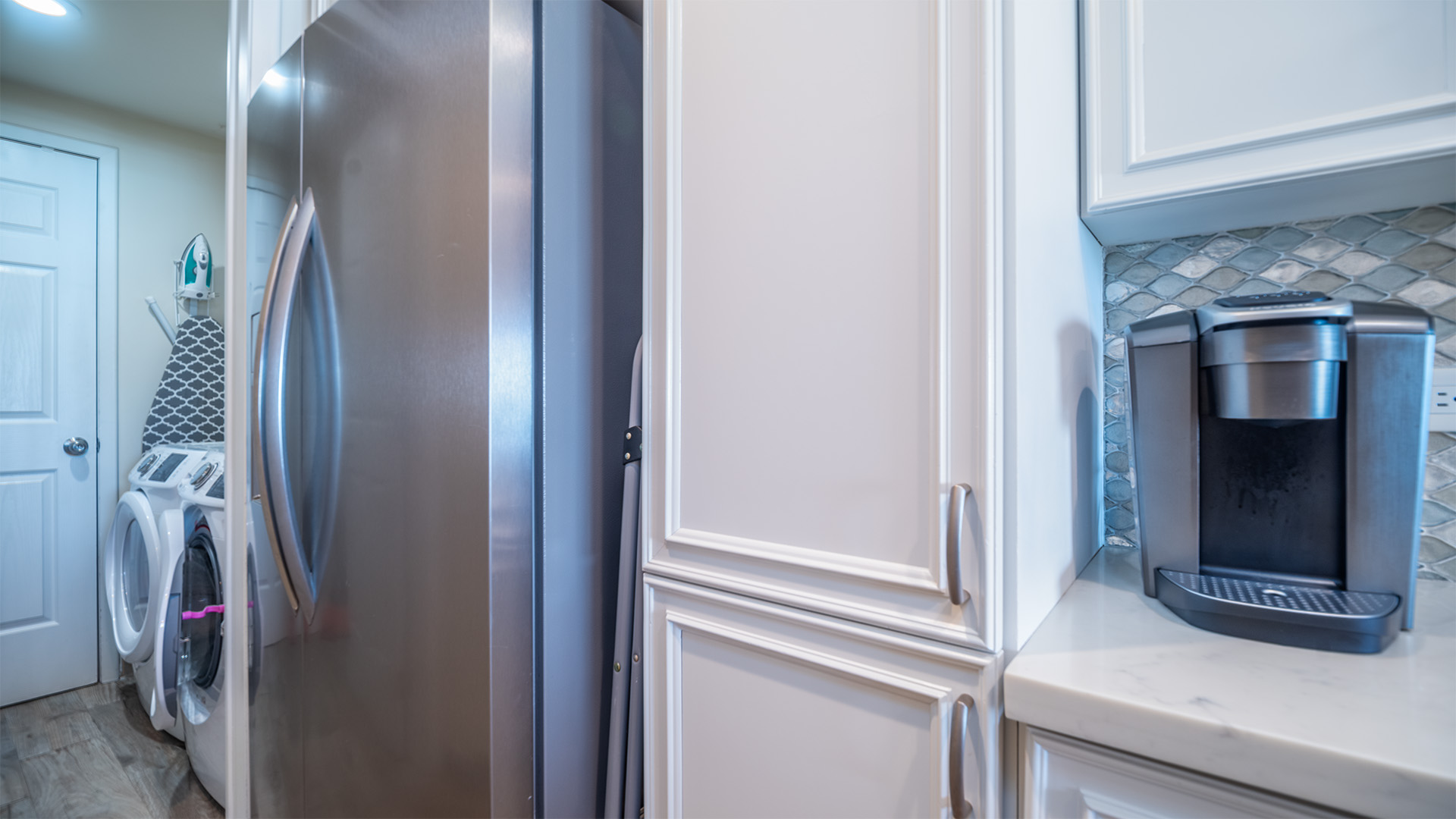 Washer and dryer off of the kitchen