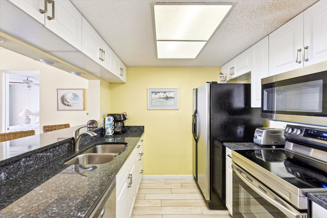 Kitchen area where you can cooked your home cooked meals.