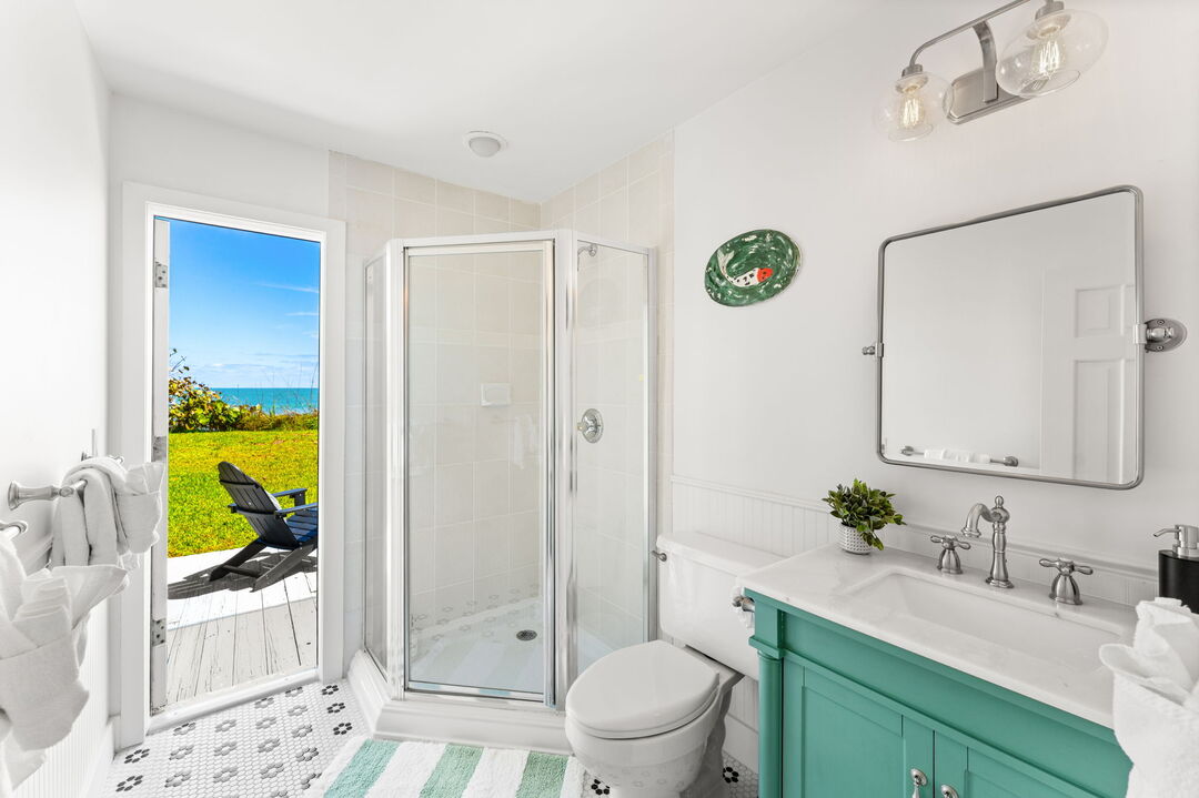 Guest bathroom w/ stand-alone shower and patio access