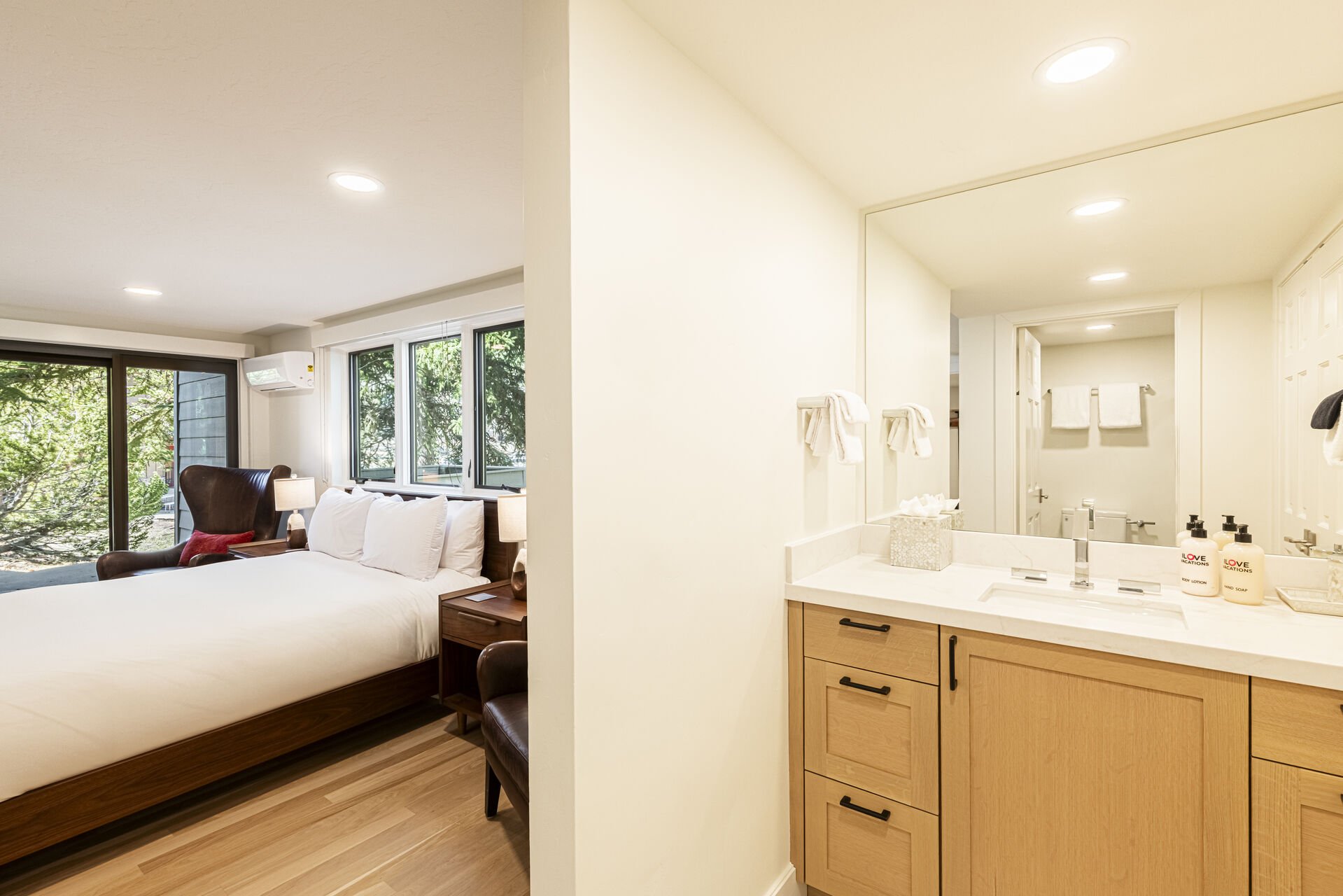 Guest en suite 2 with a well-lit vanity Guest en suite 2 with a well-lit vanity