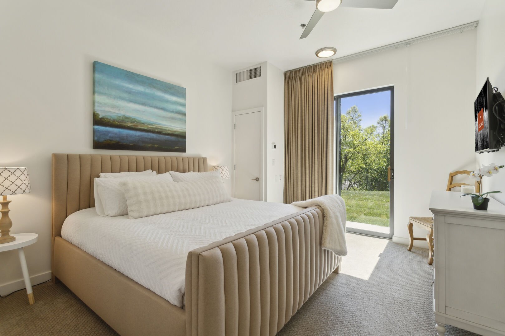 luxury bedding and bedframe with large window
