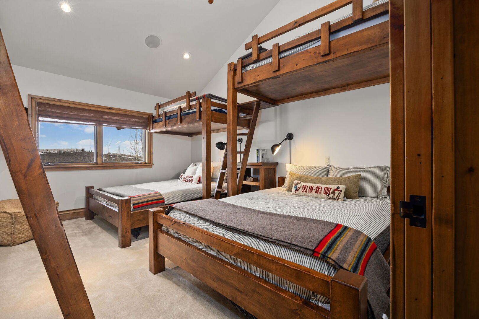 bunk suite with 4 beds and mountain views out window