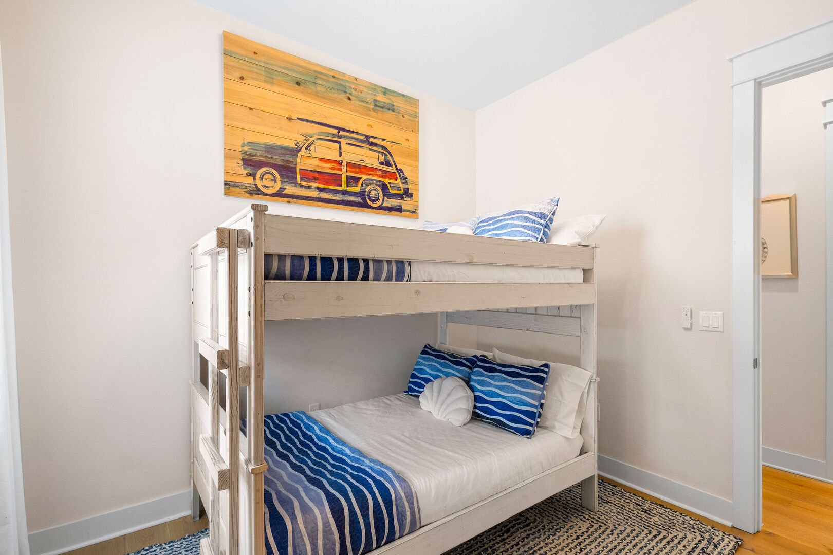 Bedroom #2 features a full/full bunk bed and a smart tv.